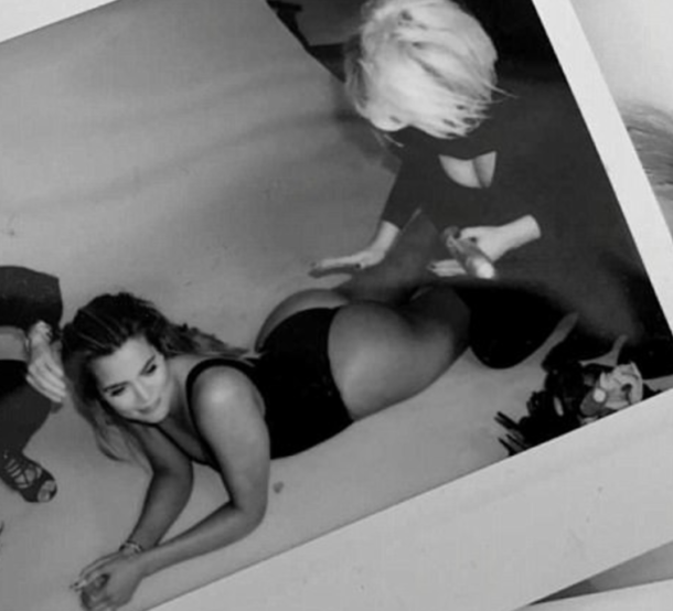 Khloe Kardashian has her butt “maked up” before photo shoots
